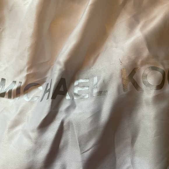 Michael Kors pebbled black leather slouch purse with fringe and emblem detail - Picture 6 of 6